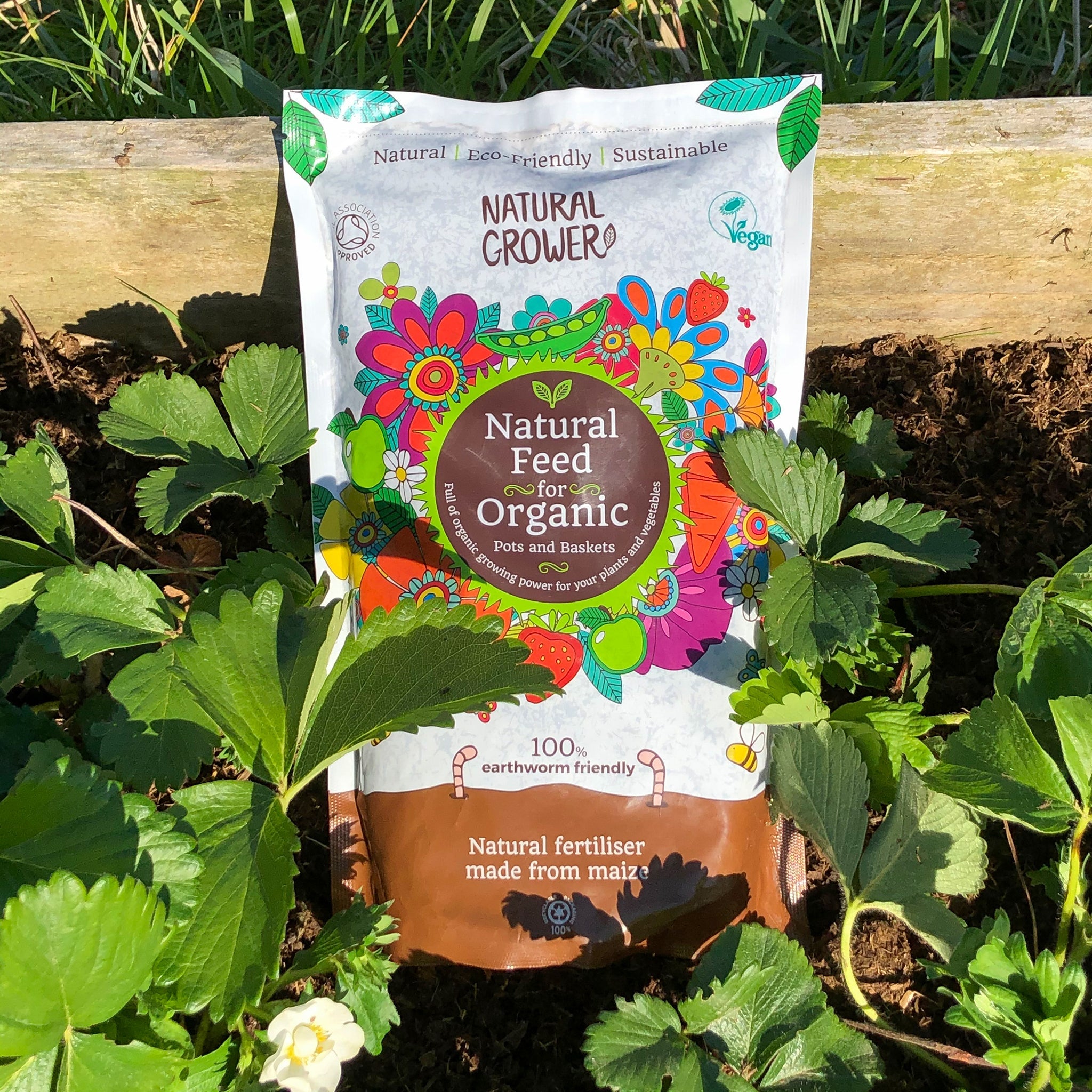 A packet of Natural Grower organic plant feed.