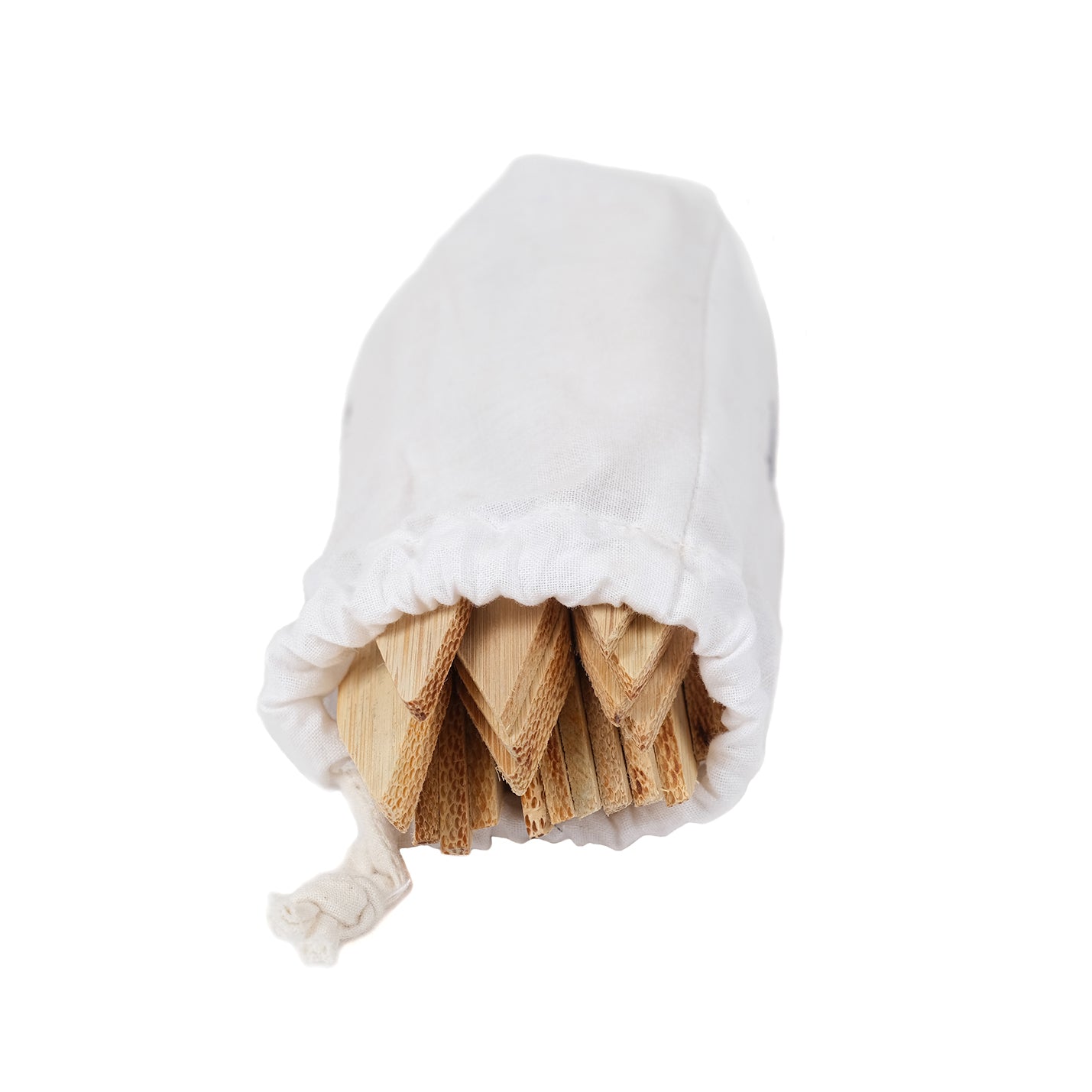 Bamboo plant labels inside a white cotton bag.