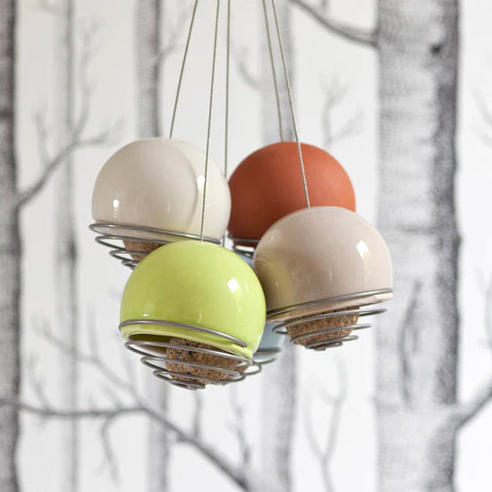 Four Birdball Belle Bird Feeders.