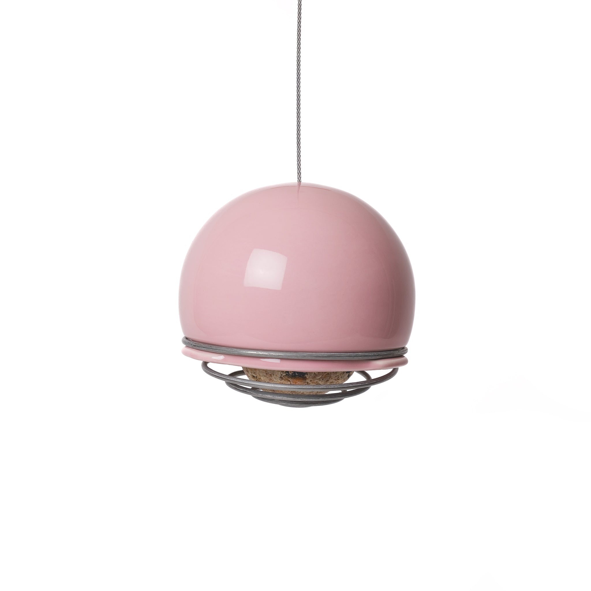 Hanging ceramic Birdball Belle bird feeder in pink with a coiled wire single suet ball holder at its base.