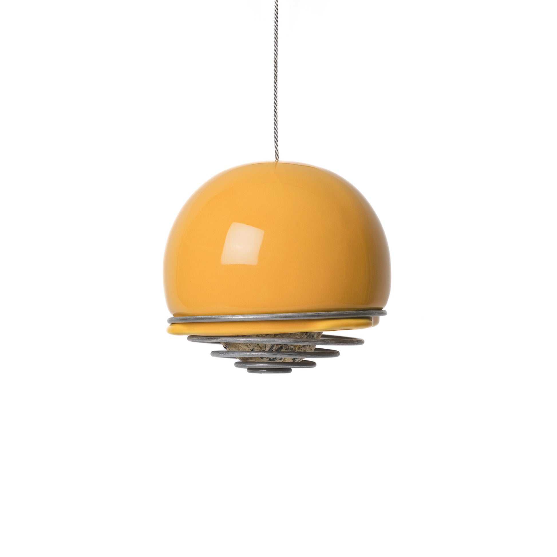 Hanging ceramic Birdball Belle bird feeder in yellow with a coiled wire single suet ball holder at its base.