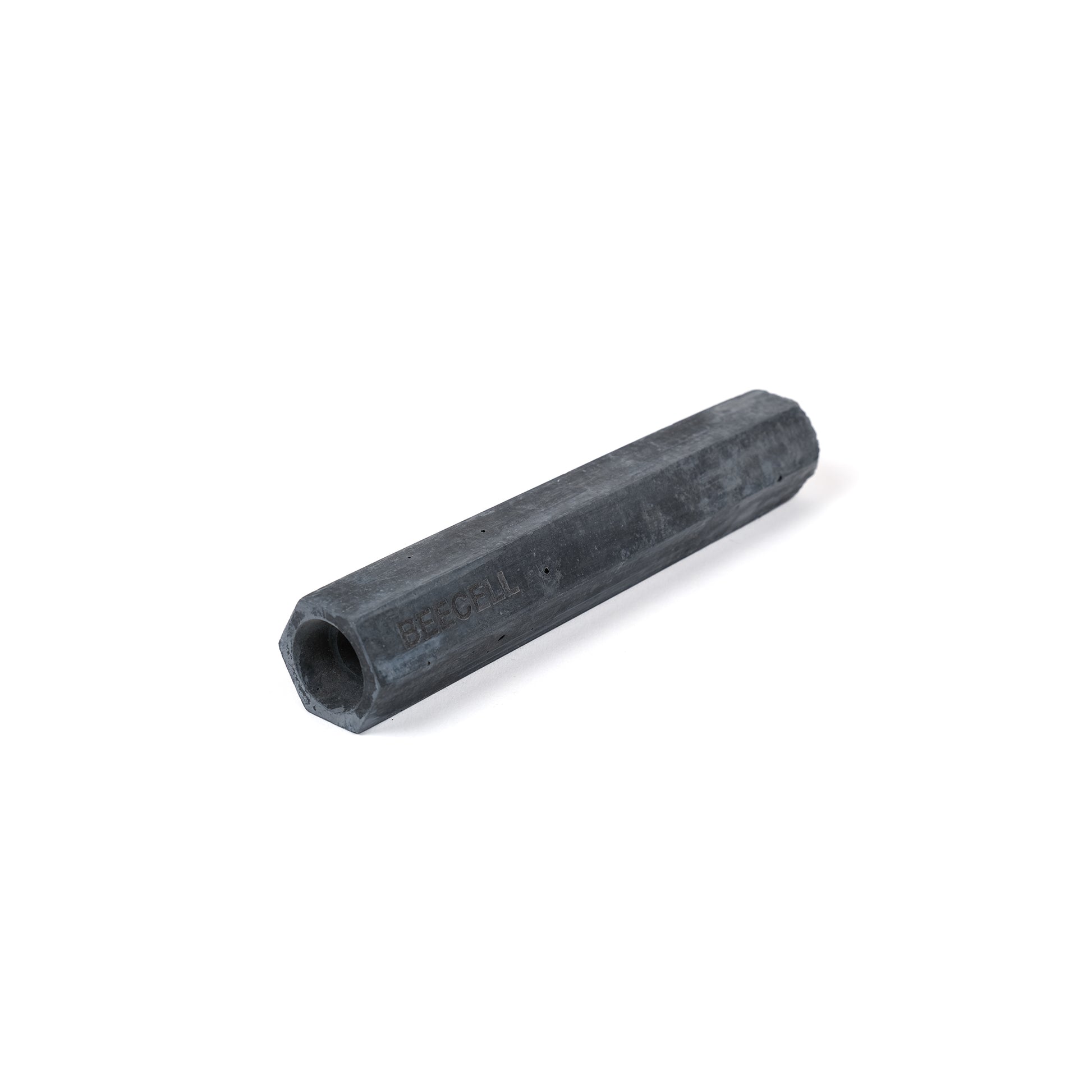 Small, charcoal grey, single cell, hexagonal bee cell for solitary bees.