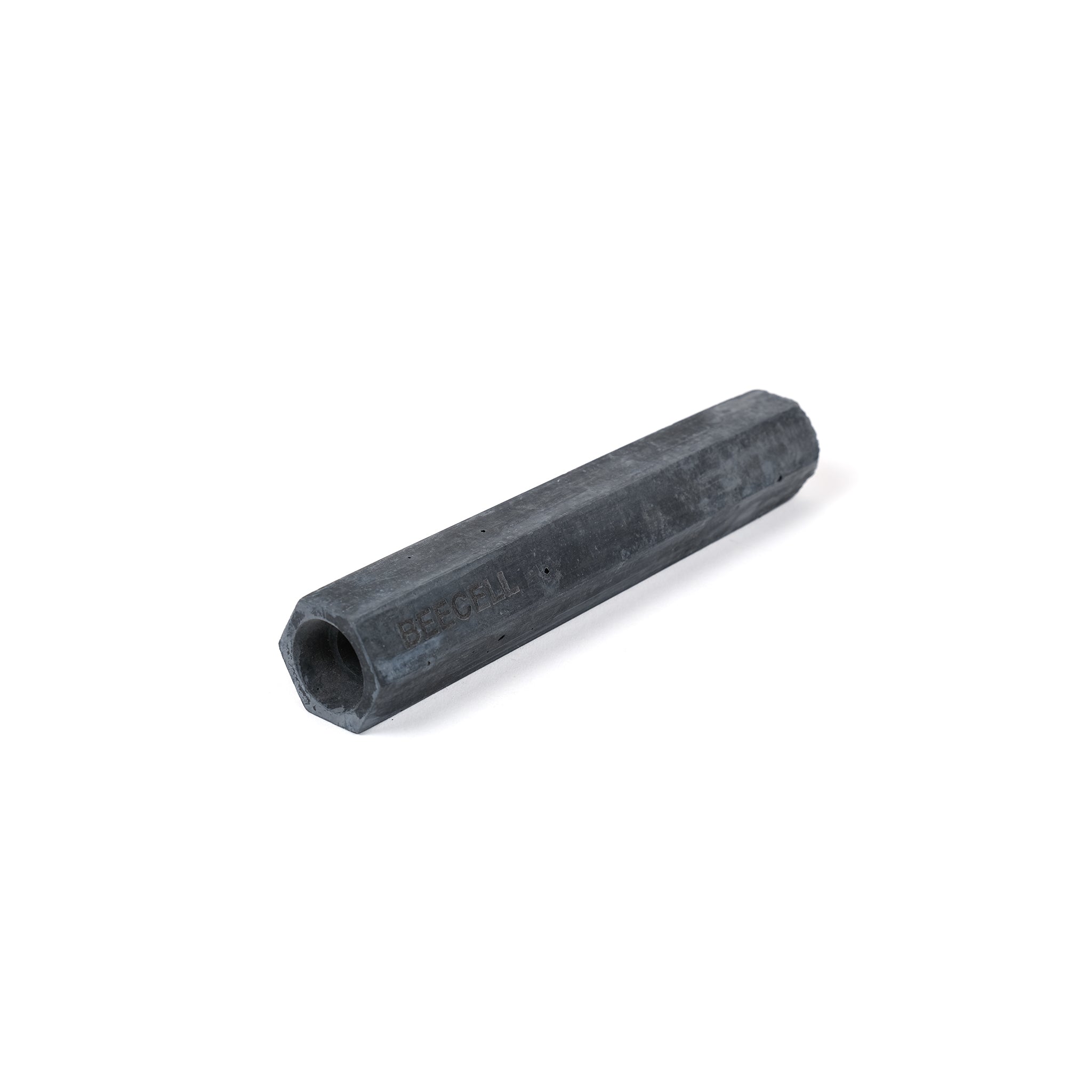 Small, charcoal grey, single cell, hexagonal bee cell for solitary bees.