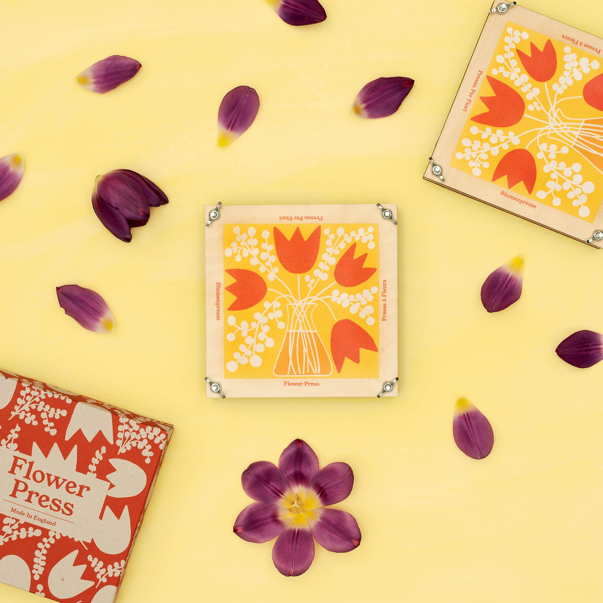 Tulip design flower press made of sustainably sourced board.