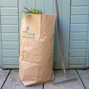 A Garden Waste Bag full of plant waste.