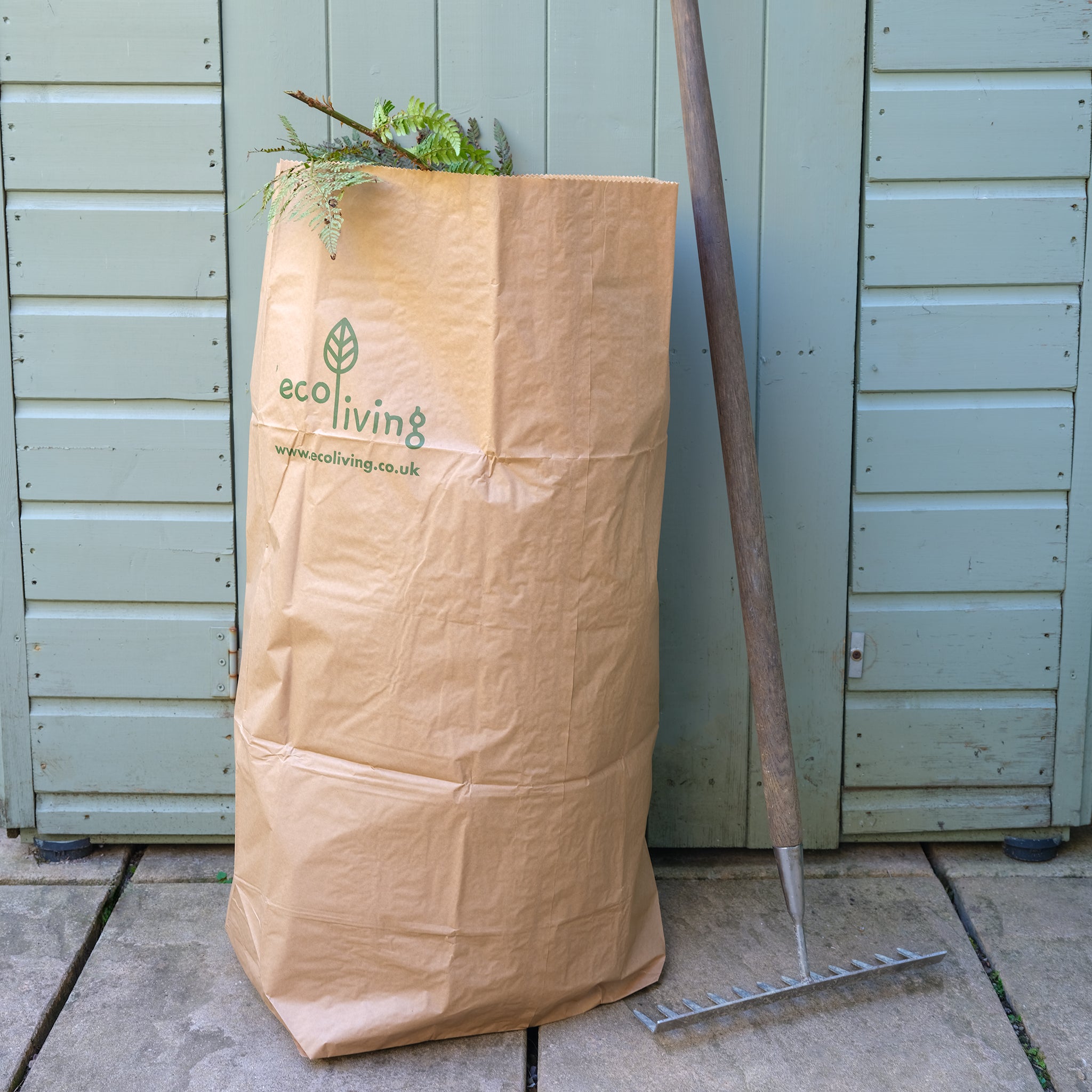 A Garden Waste Bag full of plant waste.