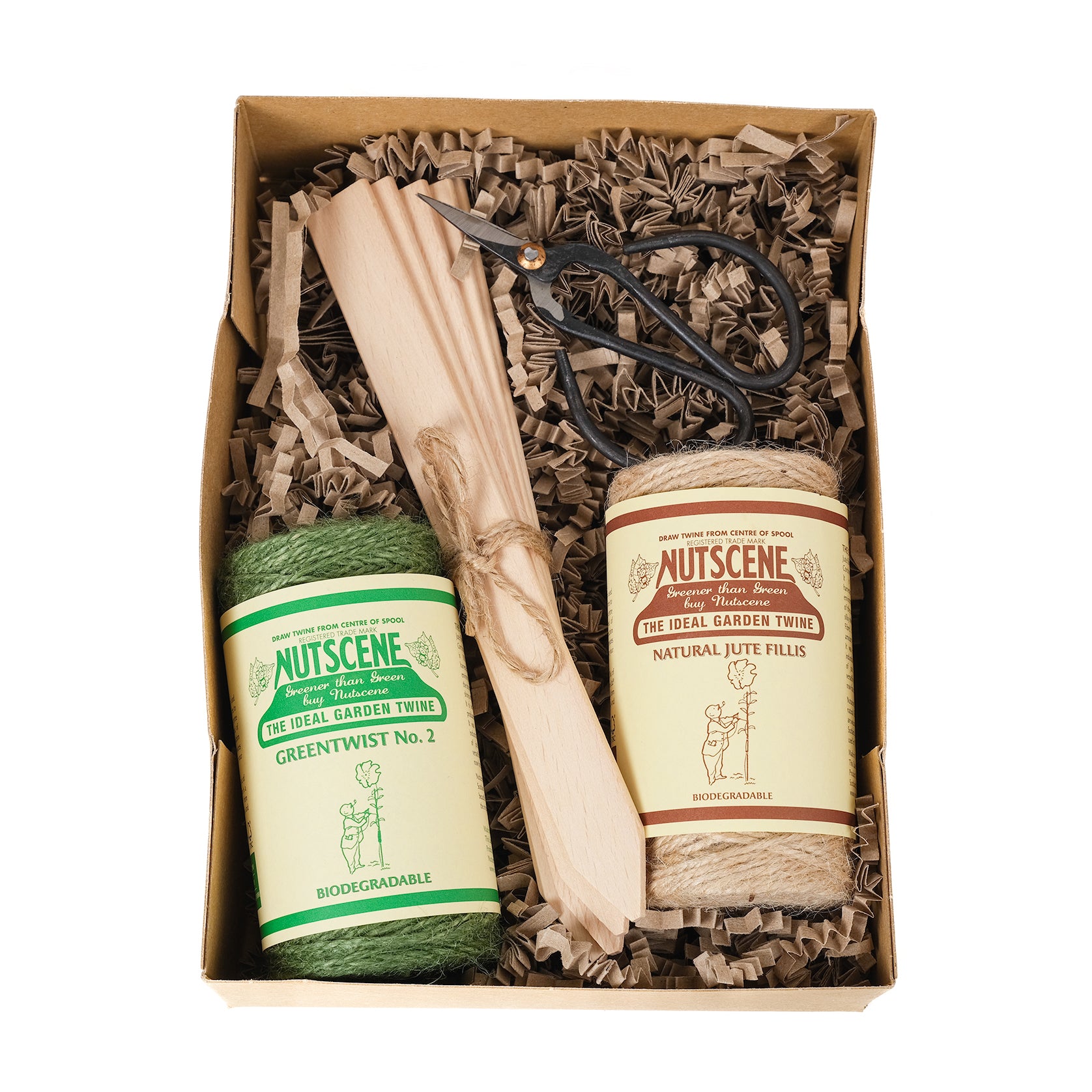 Gardener’s essentials gift box containing two spools of jute twine, mini garden scissors and five wooden plant labels.