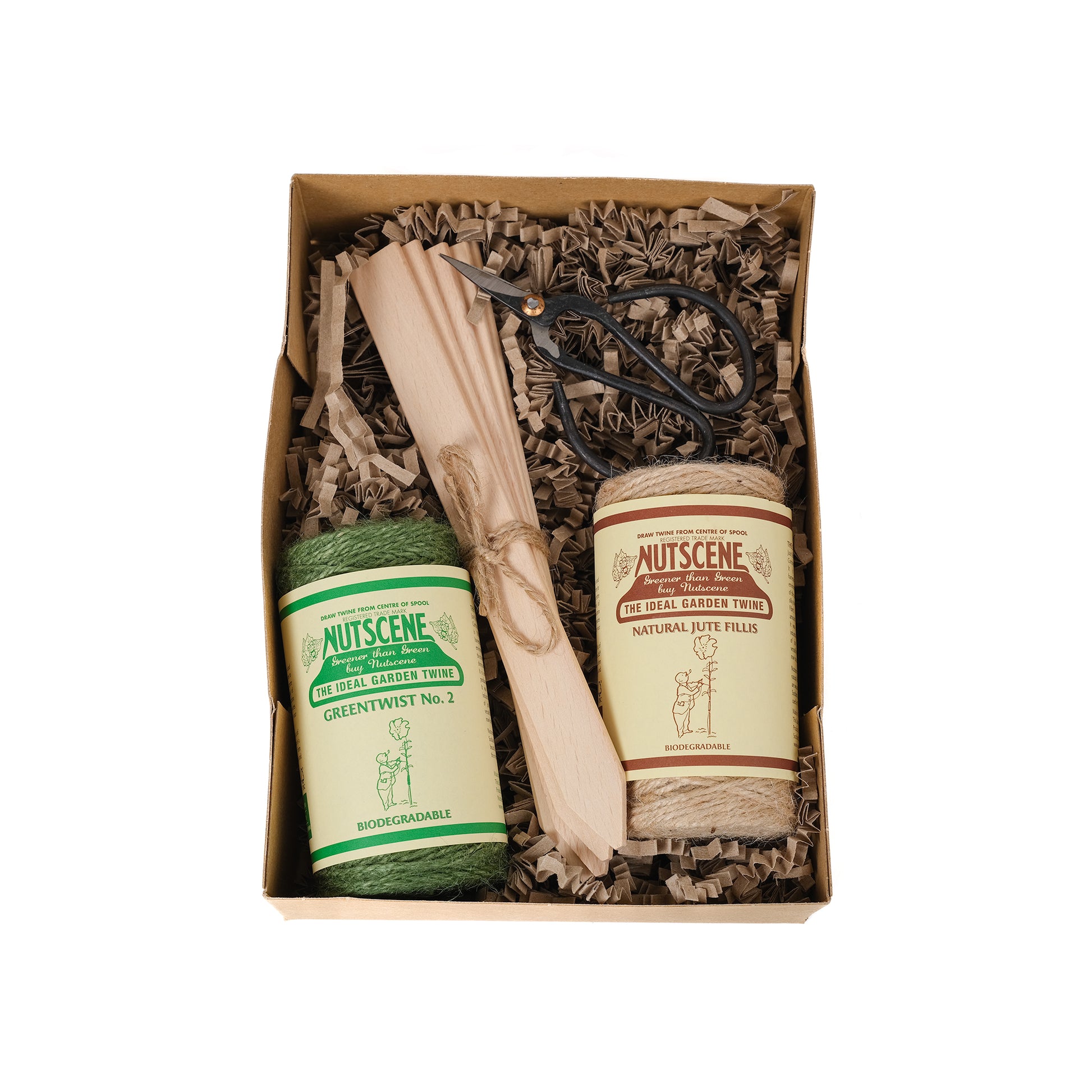 Gardener’s essentials gift box from Nutscene containing two spools of jute twine, mini garden scissors and five wooden plant labels.