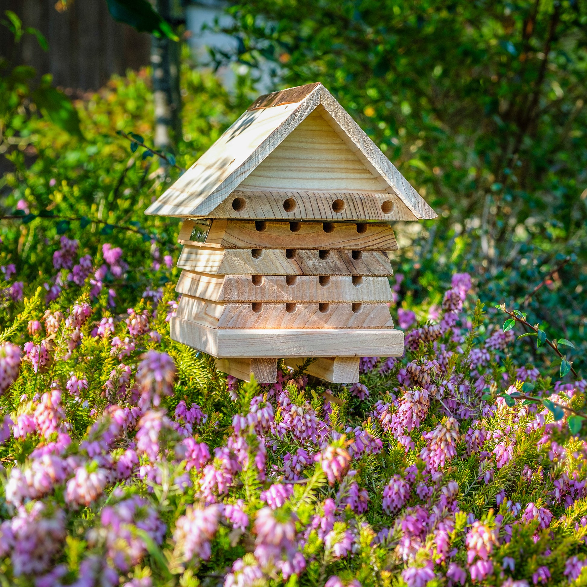 Interactive Solitary Beehive amongst flowers.