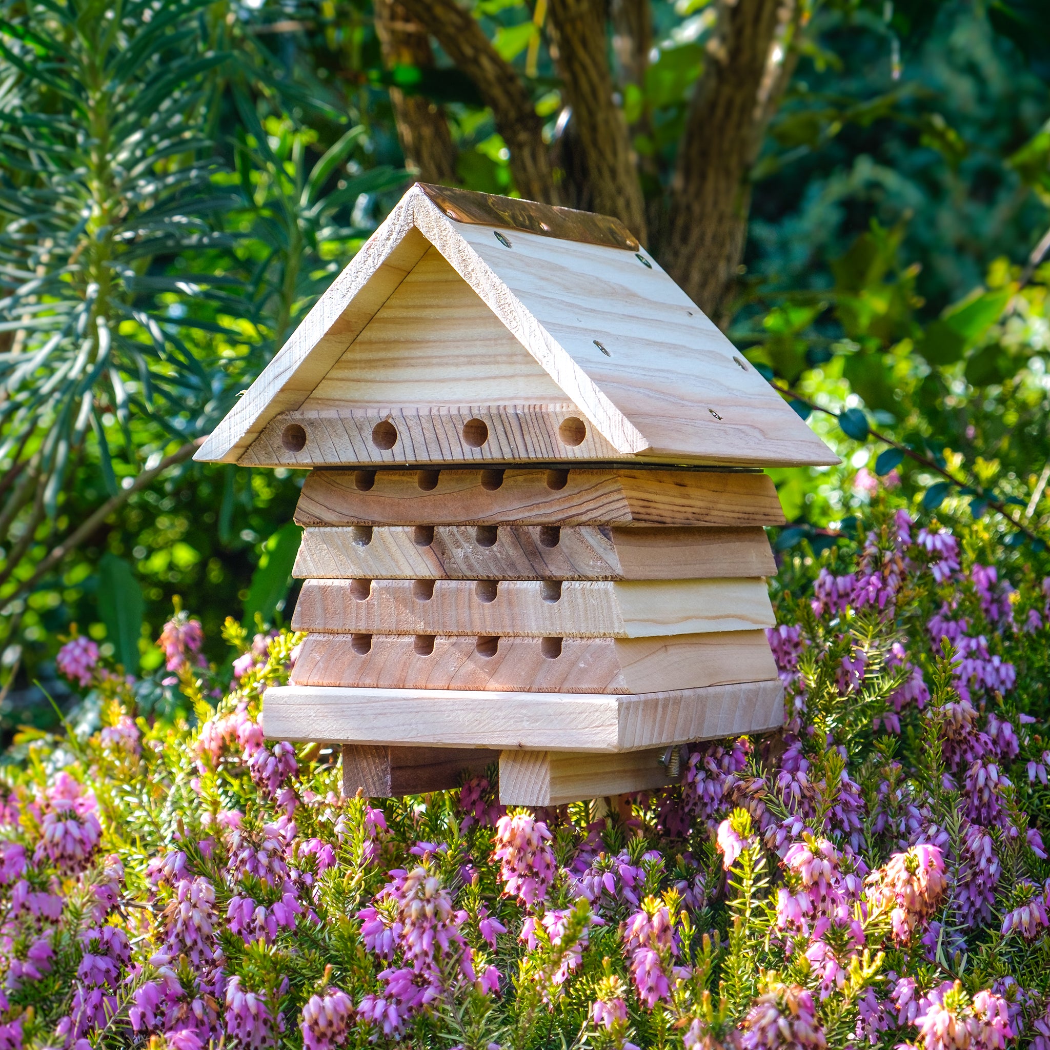Interactive Solitary Beehive amongst flowers.