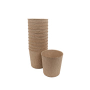 Pack of twelve, plastic free, large biodegradable grow pots made of FSC certified recycled paper pulp.
