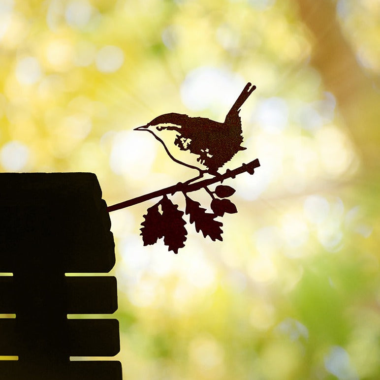 Steel metal bird silhouette and garden ornament in the shape of a wren.