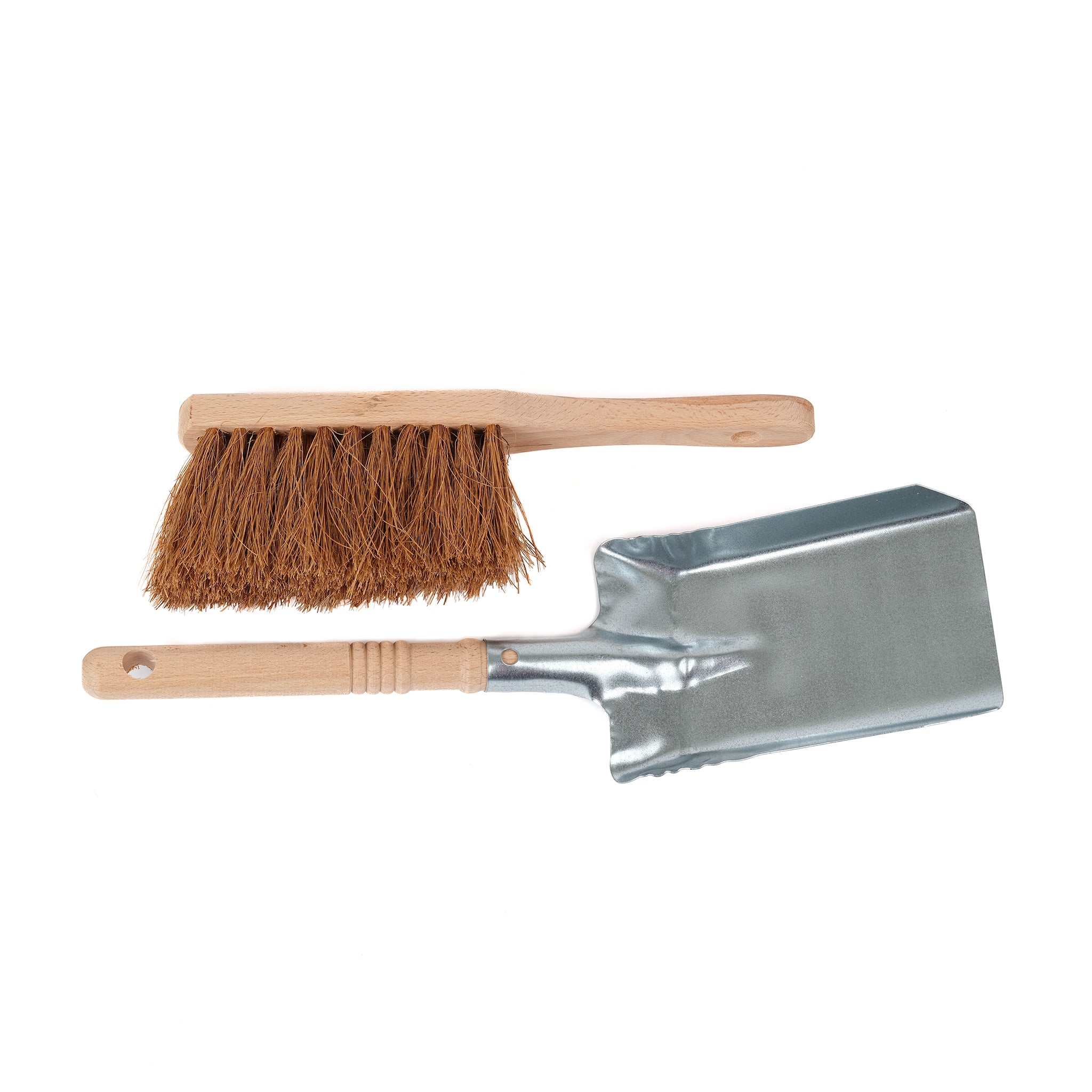Narrow dustpan made of metal with an FSC certified beechwood handle and a brush made with an FSC certified beechwood handle and coir bristles.