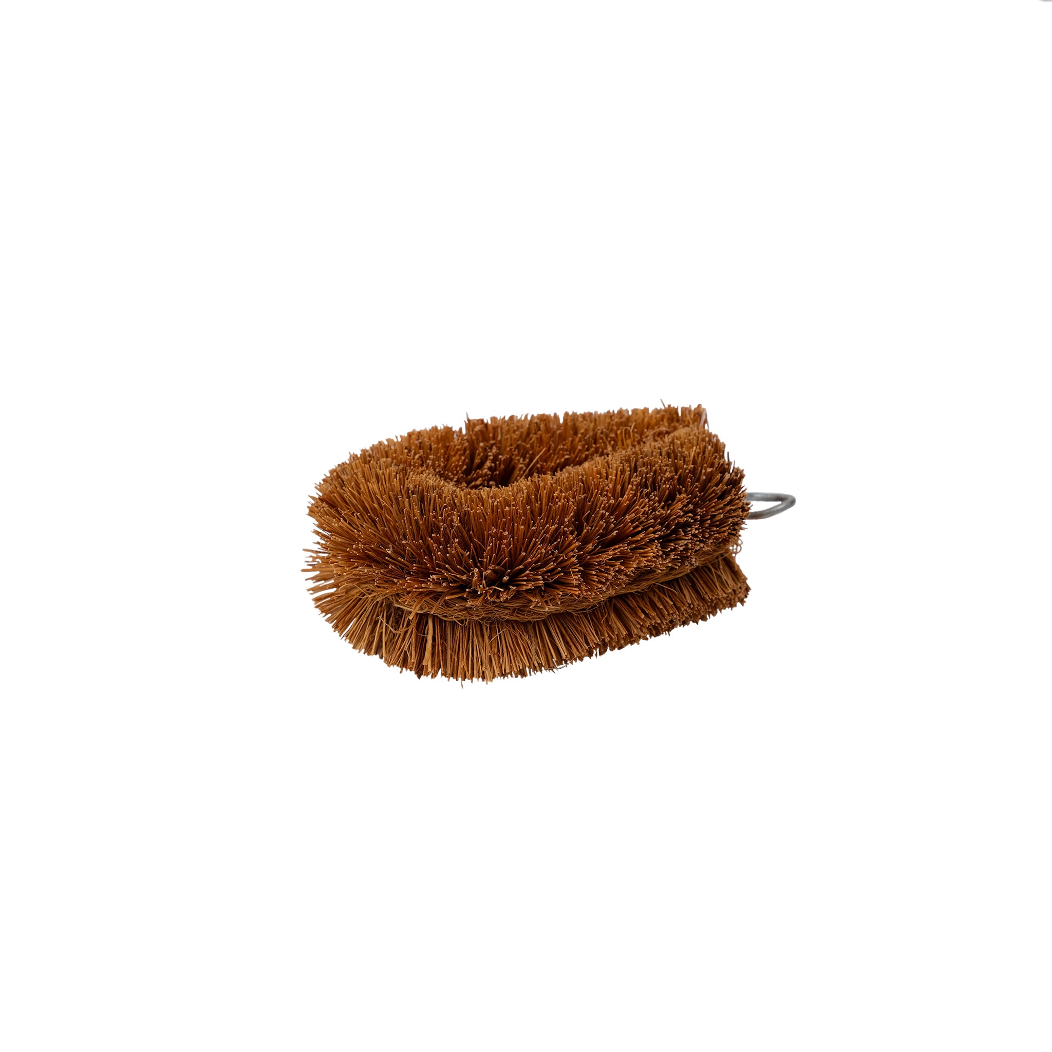 Mini coir scrubbing brush.