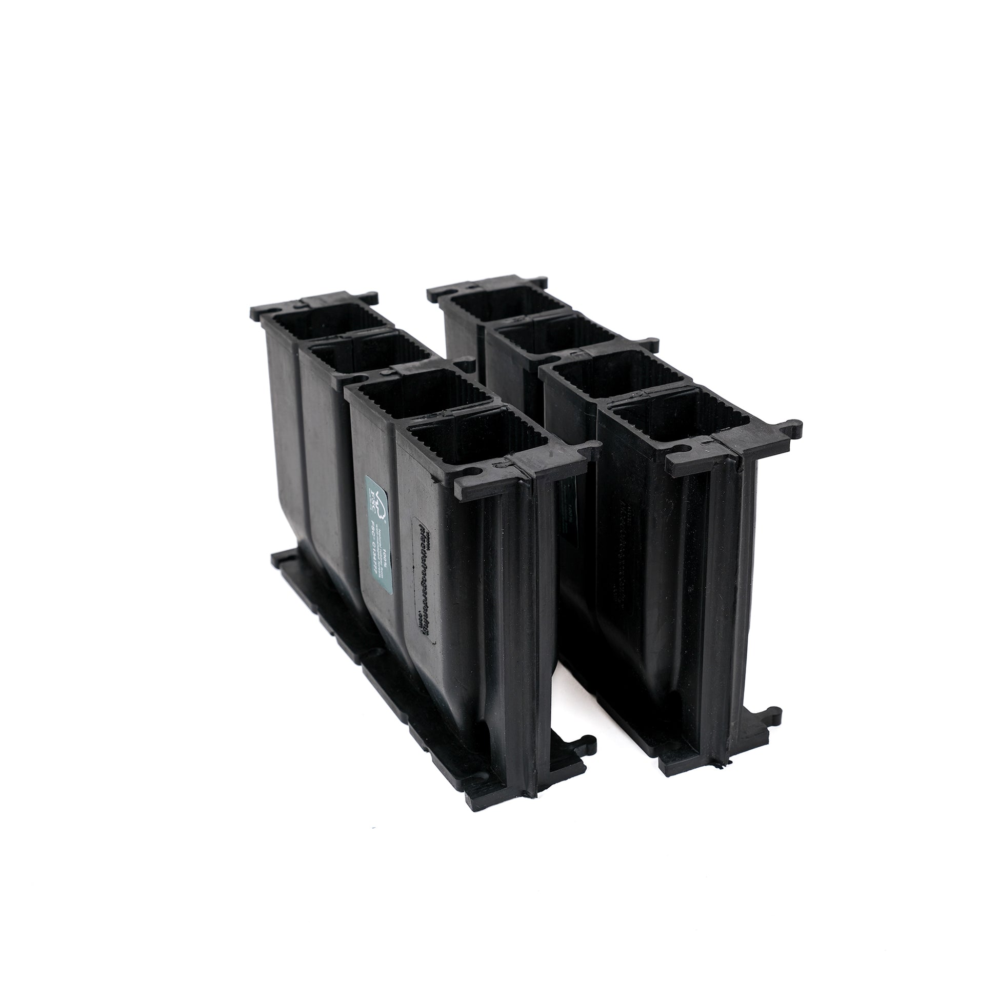 Black, plastic free, eight cell root trainer made of FSC certified, fair trade natural rubber.