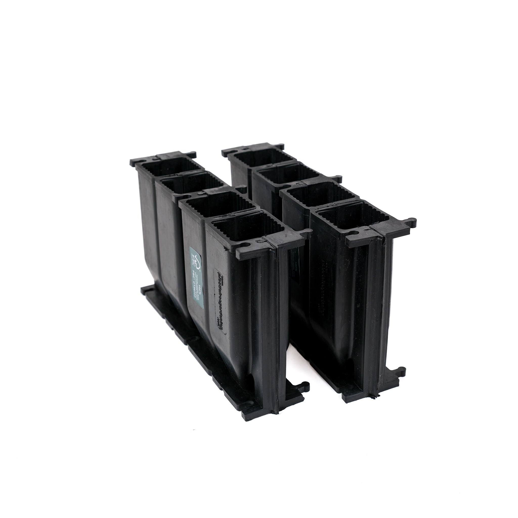 Black, plastic free, eight cell root trainer made of FSC certified, fair trade natural rubber.