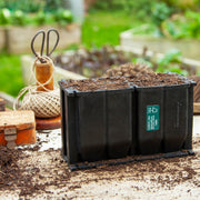 Black, plastic free, eight cell root trainer made of FSC certified, fair trade natural rubber.