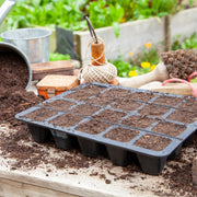Black, plastic free, twenty cell seed tray made of FSC certified, fair trade natural rubber.