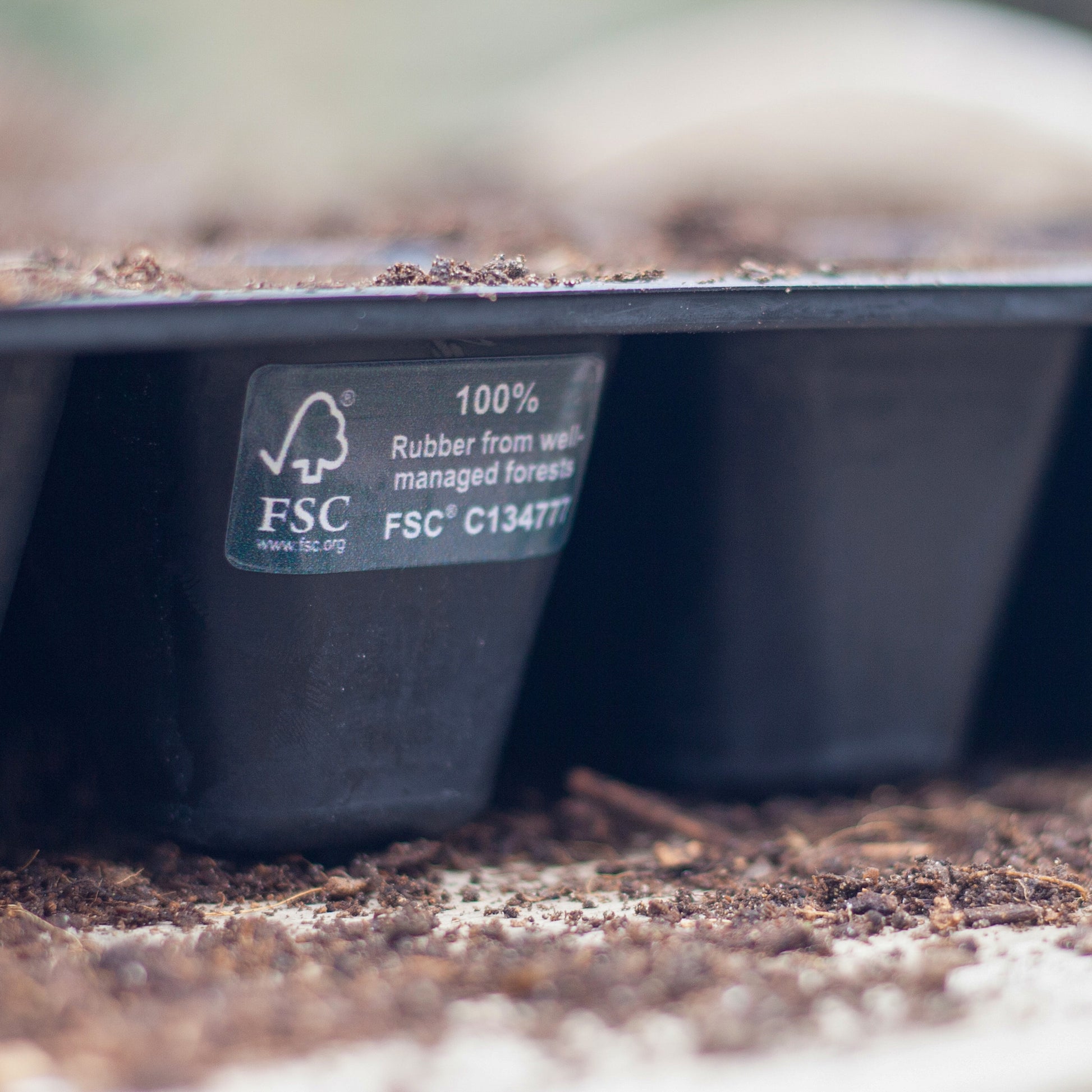 Black, plastic free, twenty cell seed tray made of FSC certified, fair trade natural rubber.