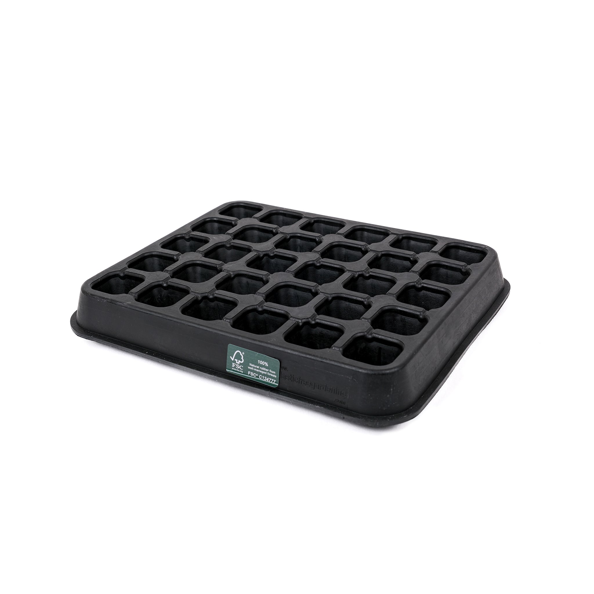 Black, plastic free, thirty cell seed tray with small cells made of FSC certified, fair trade natural rubber.
