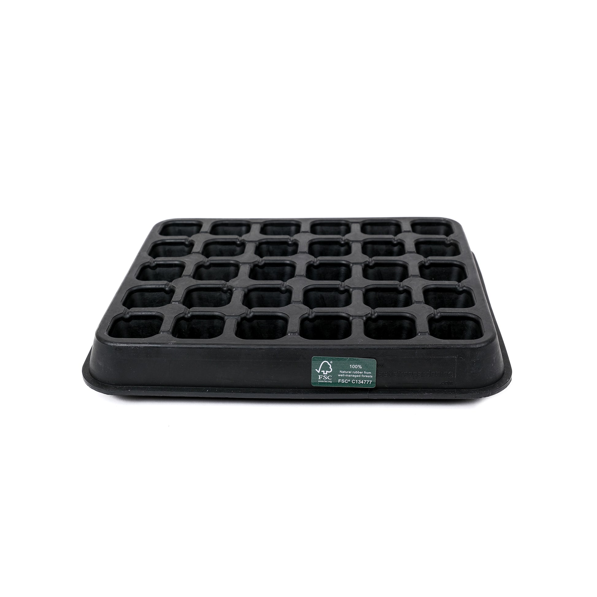 Black, plastic free, thirty cell seed tray with small cells made of FSC certified, fair trade natural rubber.