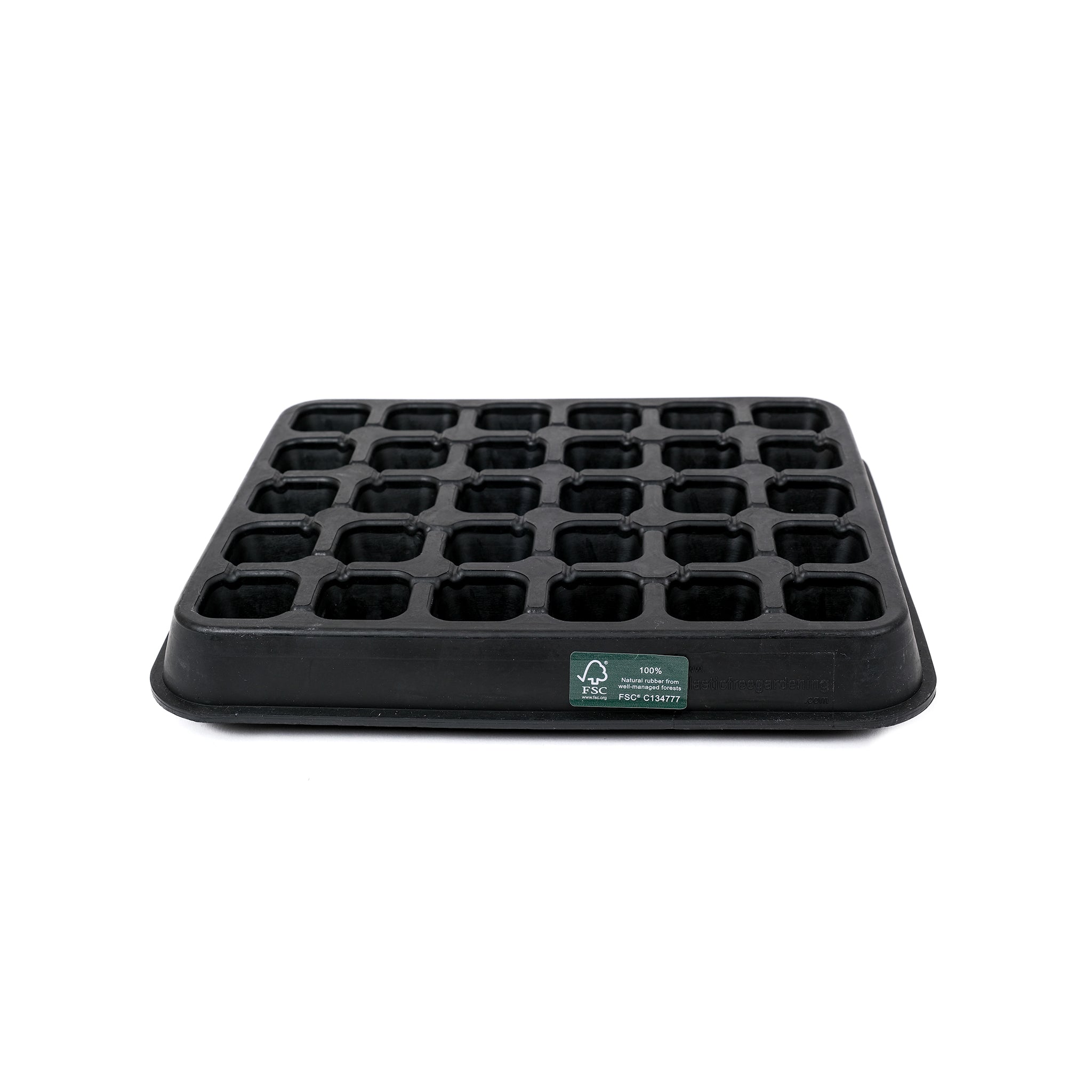 Black, plastic free, thirty cell seed tray with small cells made of FSC certified, fair trade natural rubber.