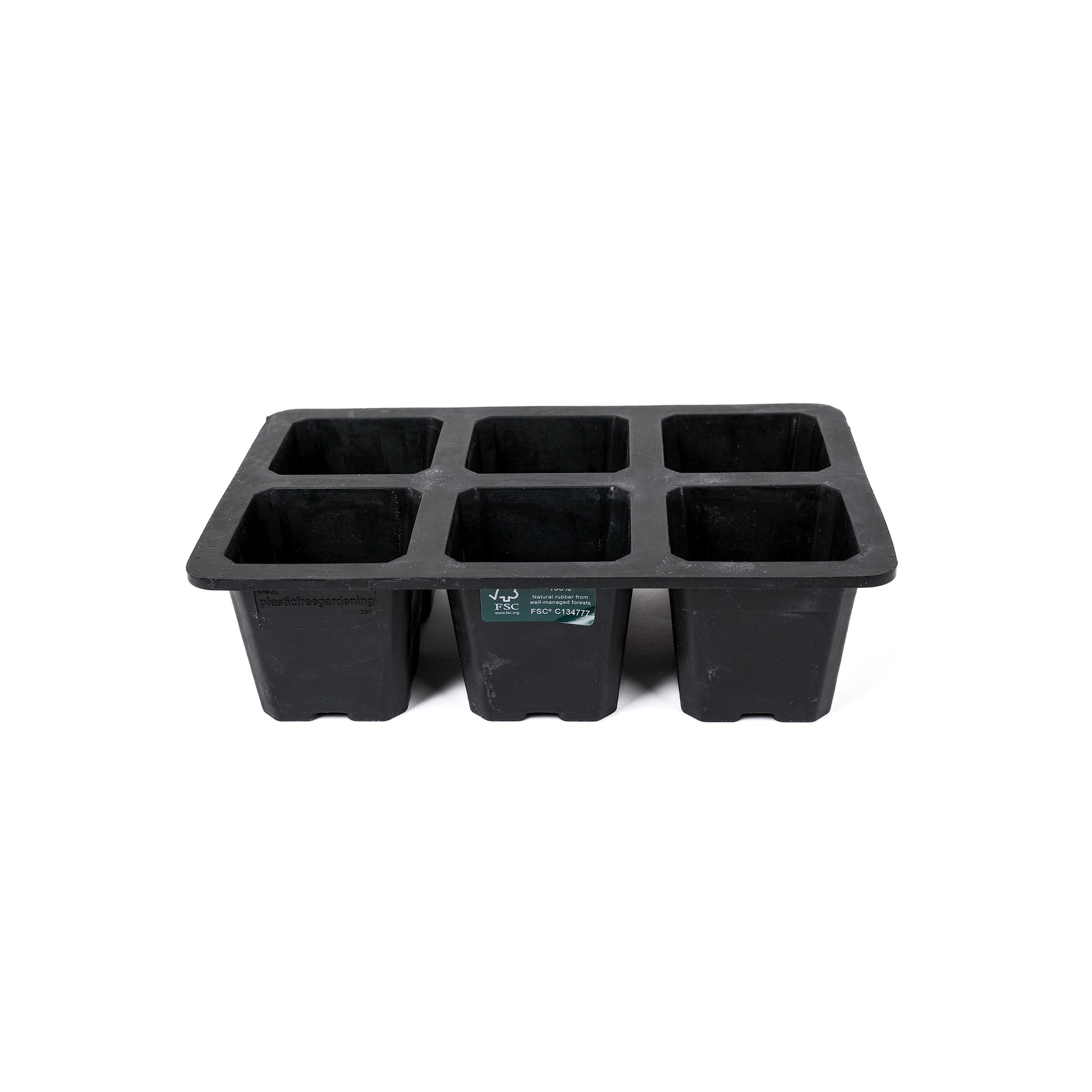 Black, plastic free, six cell seed tray with extra large cells made of FSC certified, fair trade natural rubber.