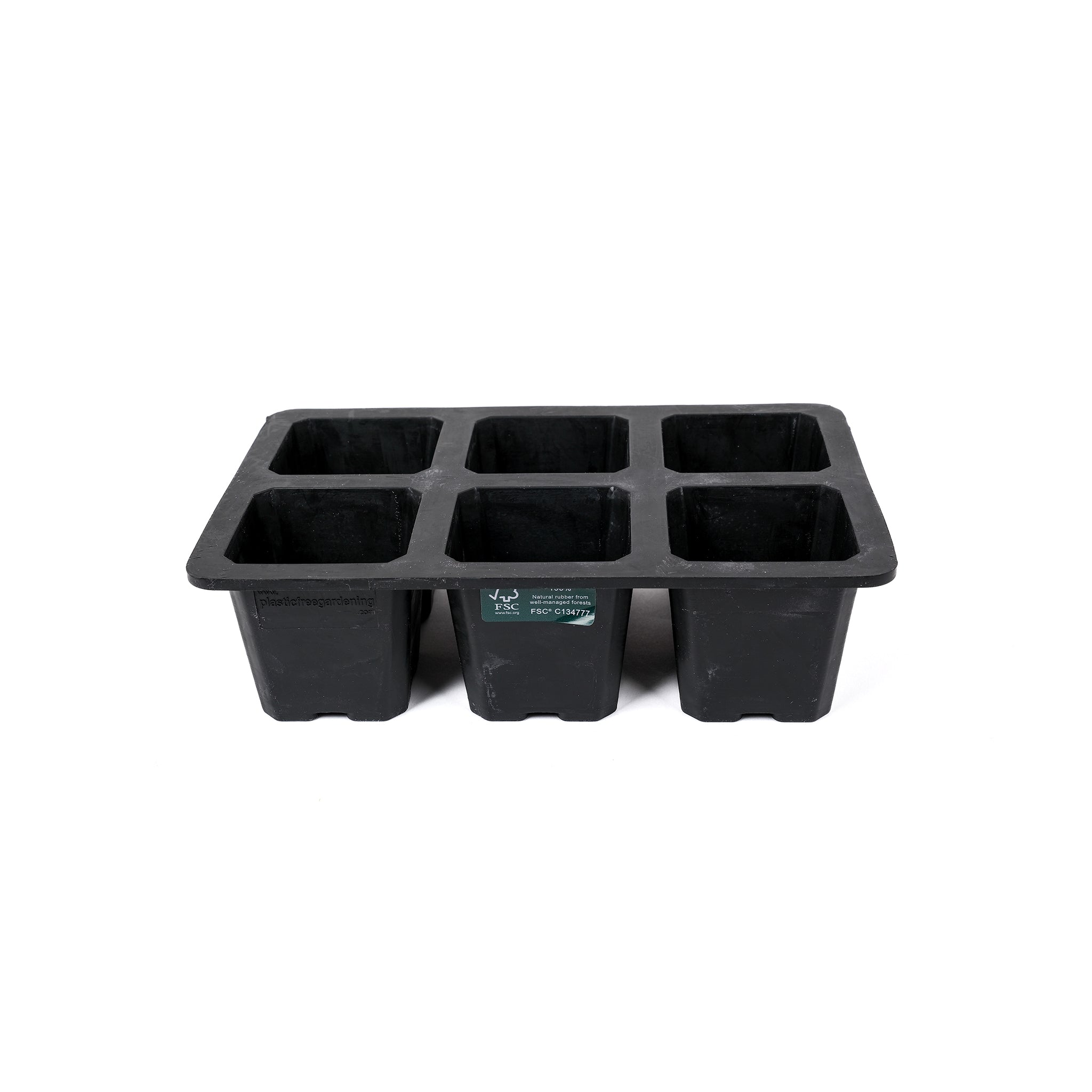 Black, plastic free, six cell seed tray with extra large cells made of FSC certified, fair trade natural rubber.