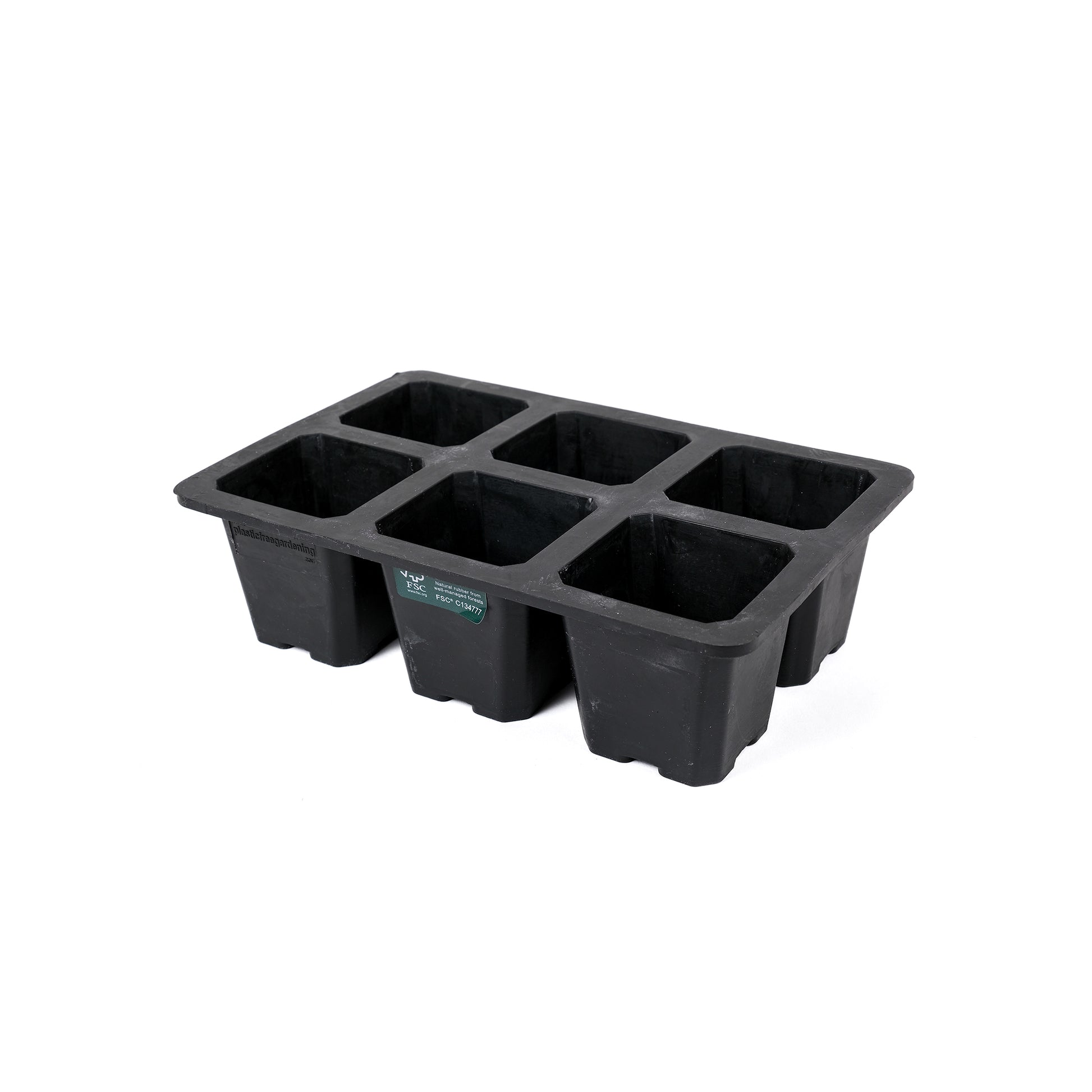 Black, plastic free, six cell seed tray with extra large cells made of FSC certified, fair trade natural rubber.