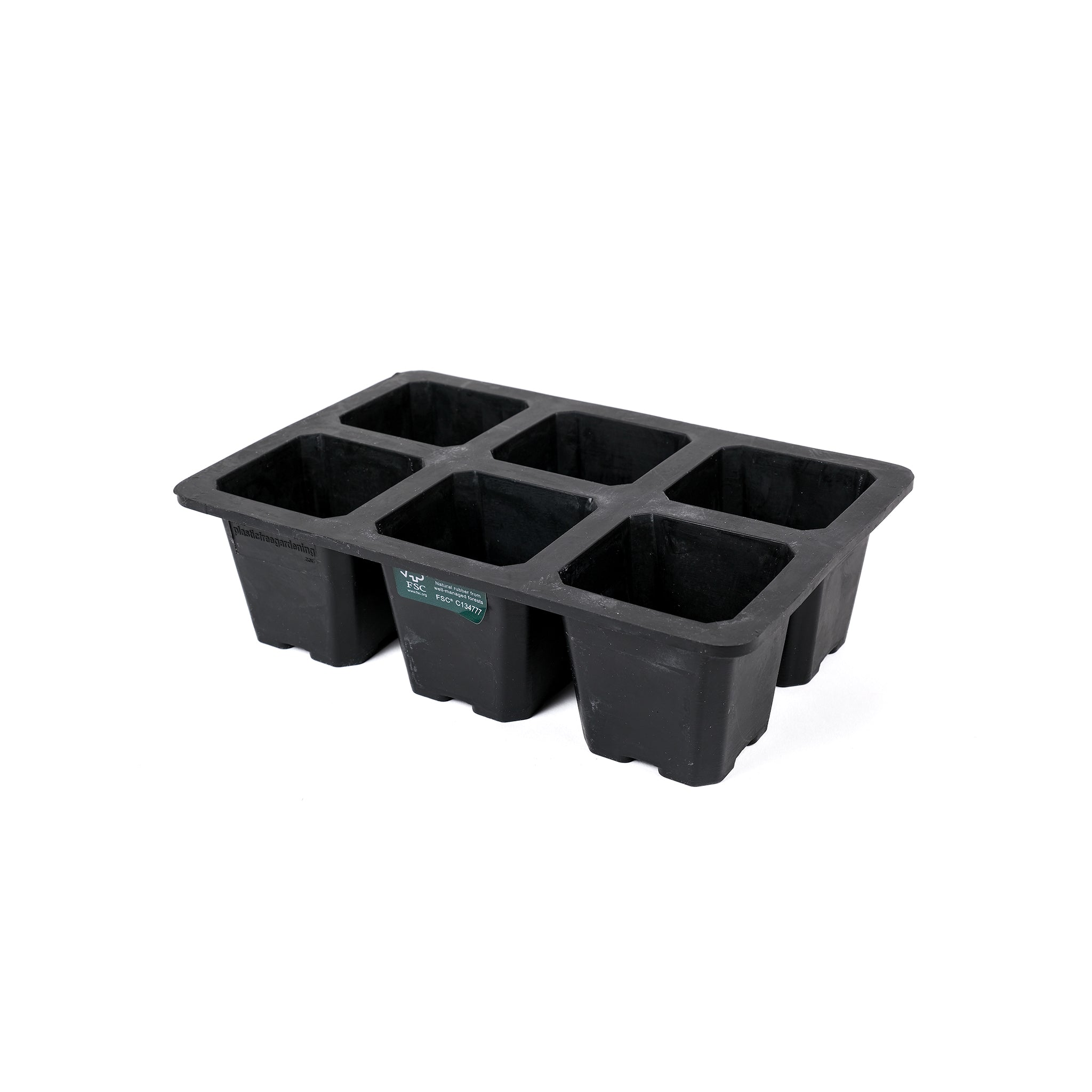 Black, plastic free, six cell seed tray with extra large cells made of FSC certified, fair trade natural rubber.