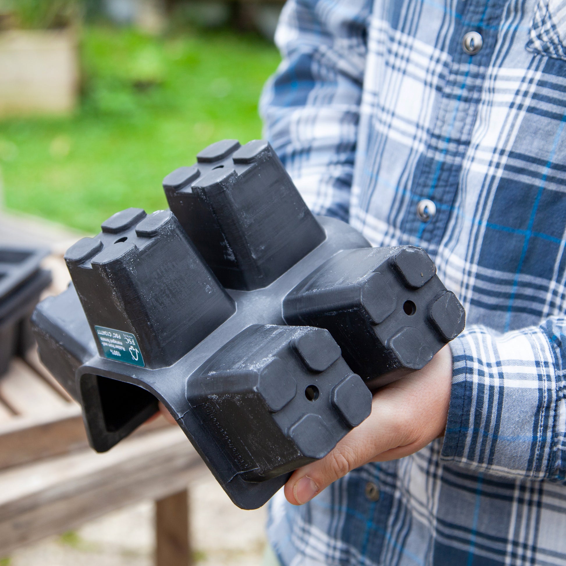 Black, plastic free, six cell seed tray with extra large cells made of FSC certified, fair trade natural rubber.