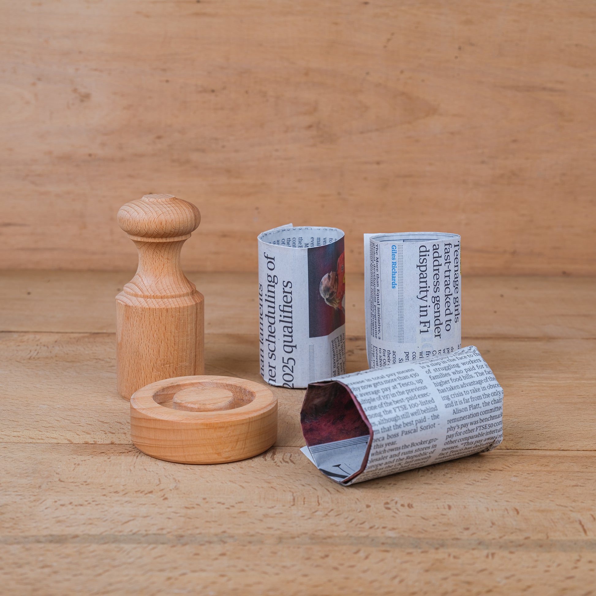 Paper pot maker made from sustainably sourced beech wood with plant pots made from old newspaper.