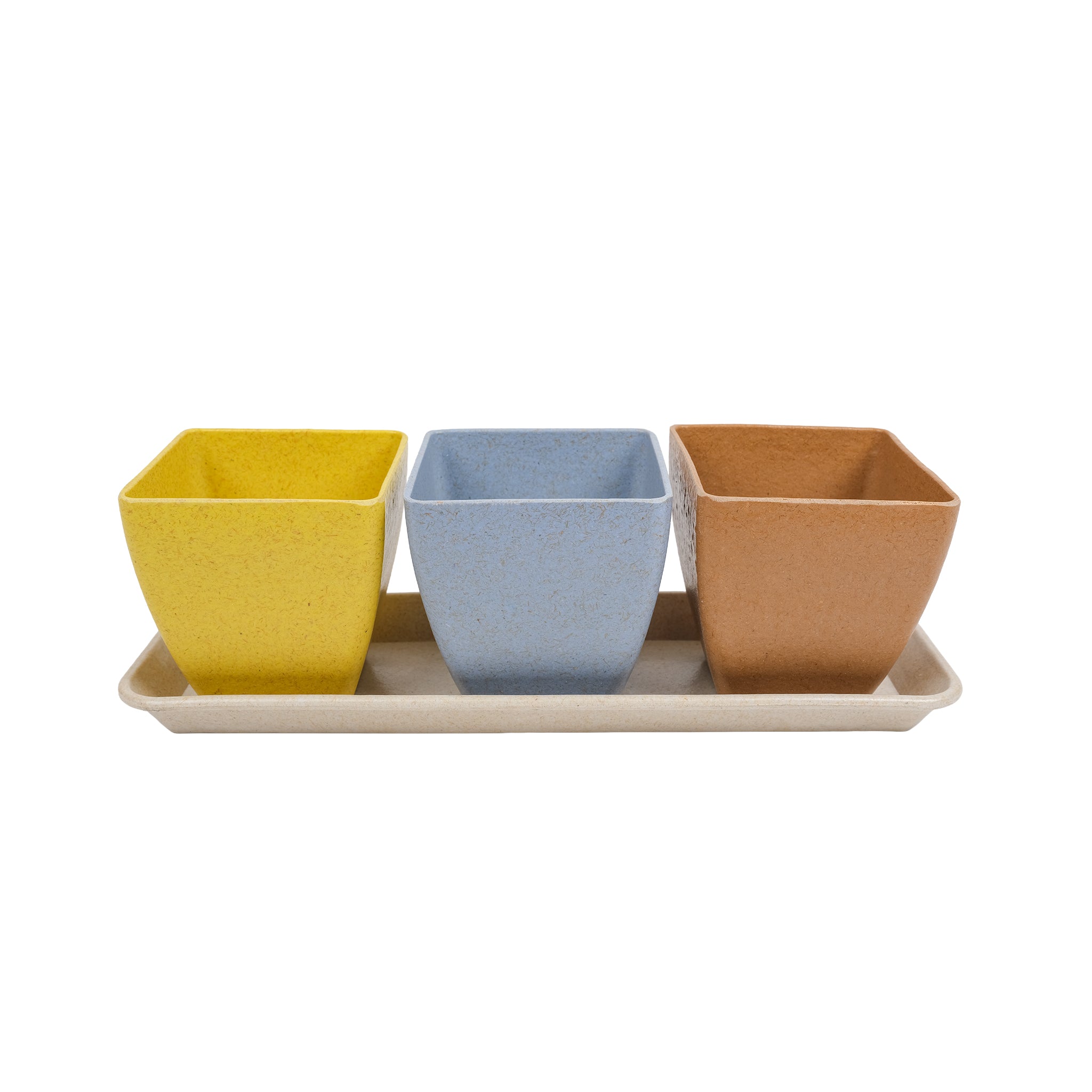 Set of three pots with a saucer, designed for a windowsill. The pots are yellow, blue and brown.