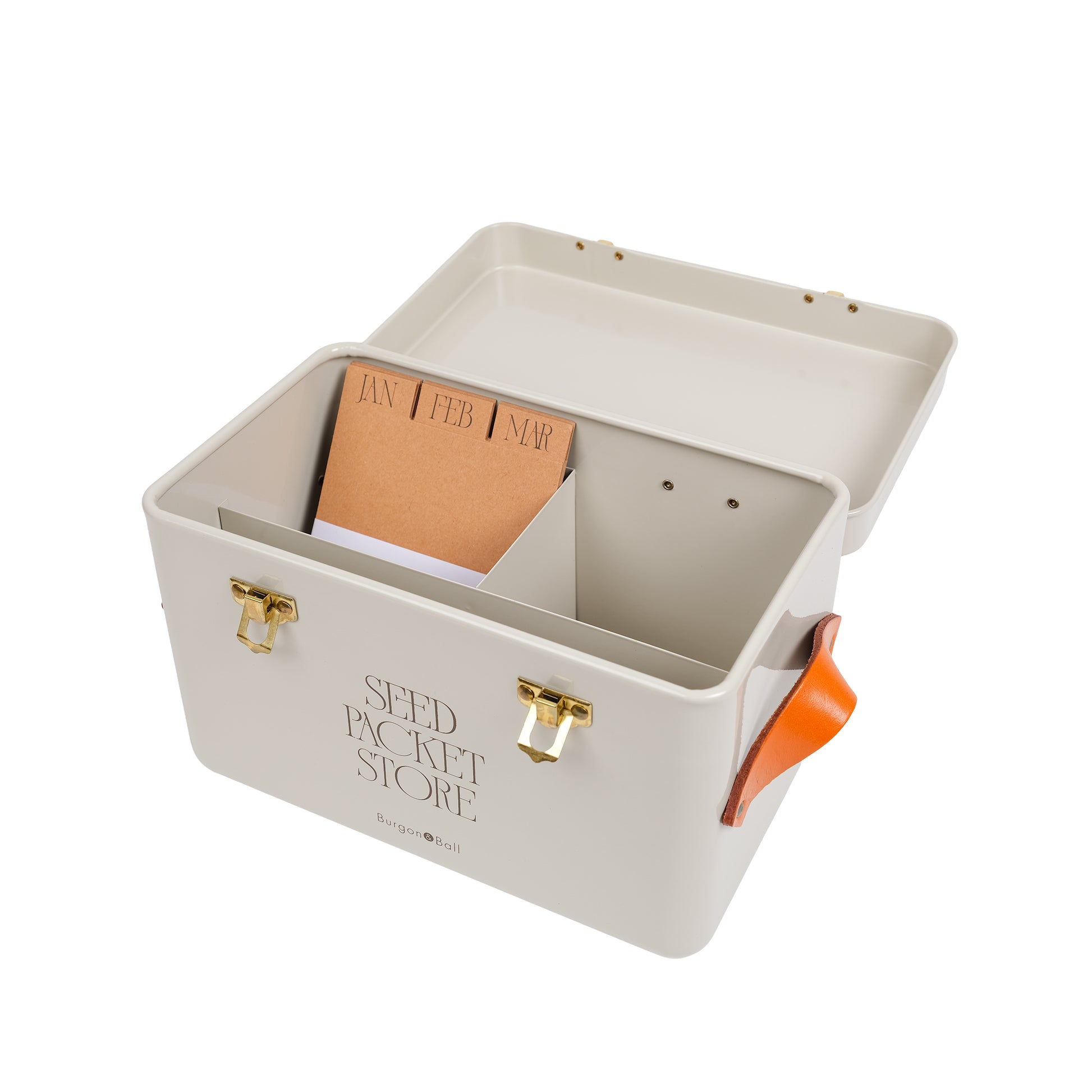 Seed packet storage tin in a mushroom colour with its lid open showing brown monthly index card dividers inside.