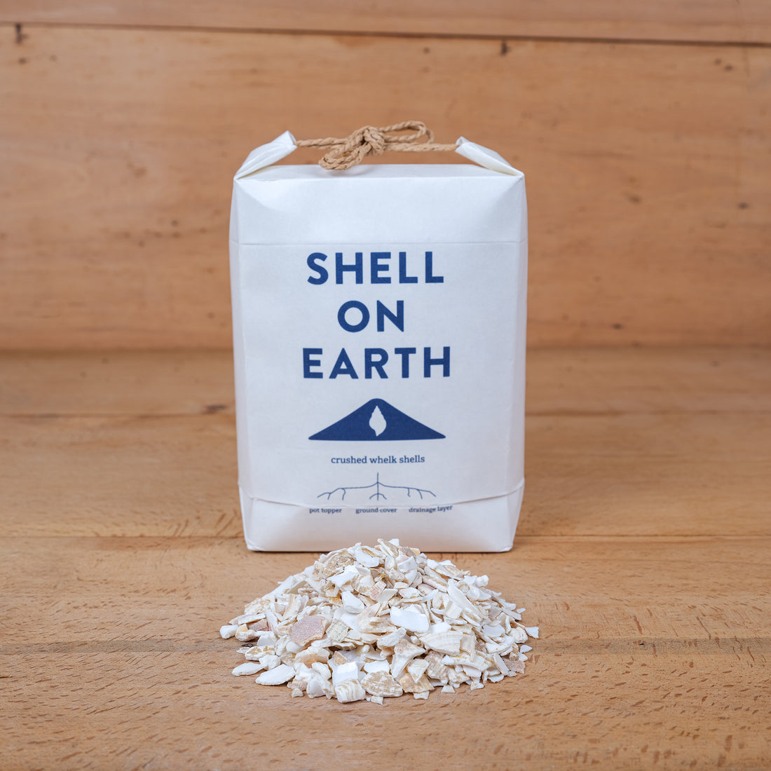 One kilogram mini bag of crushed shells from Shell on Earth with shells. Used for top dressing plants both indoors and outdoors.