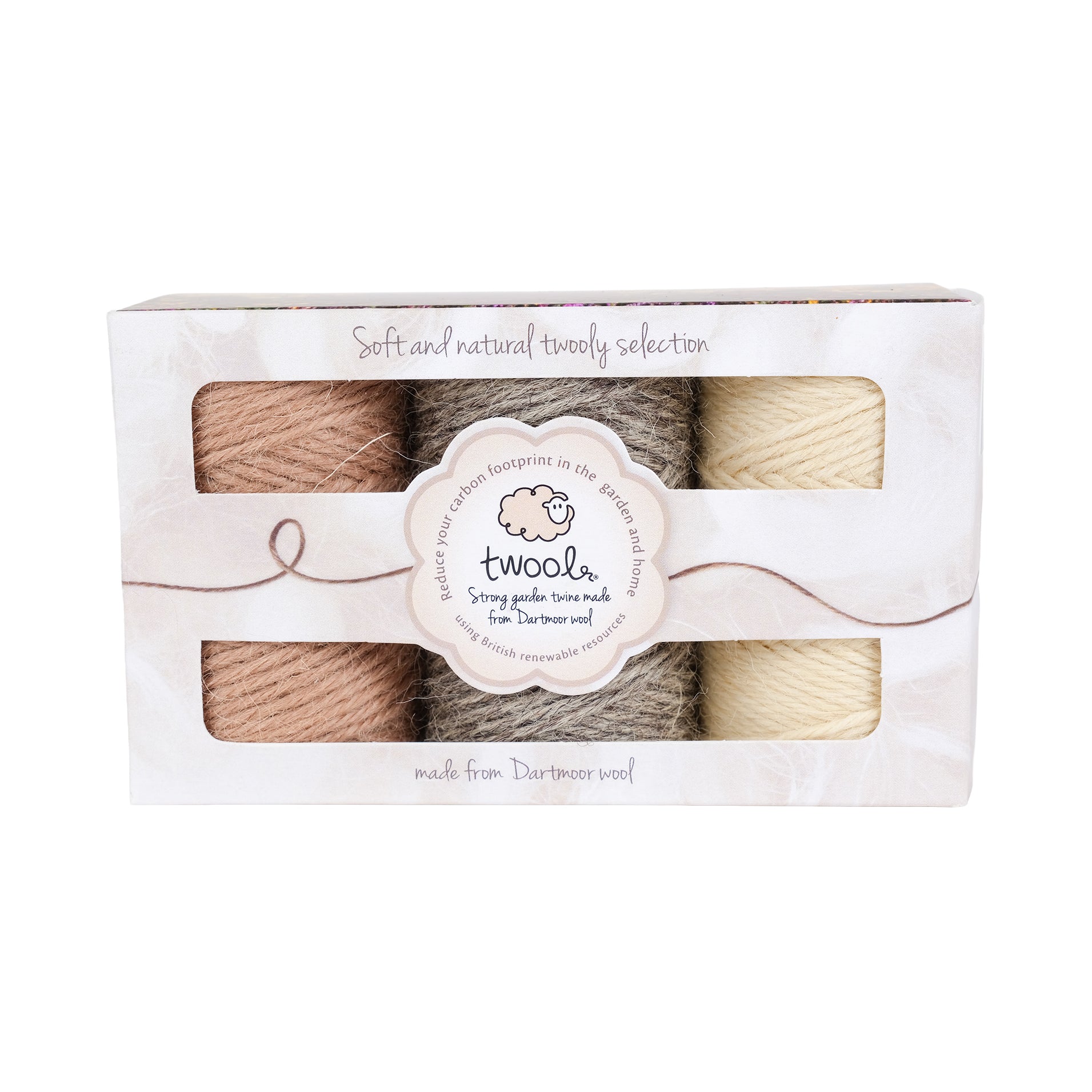 Gift box containing three, thirty five metre spools of wool twine in soft and natural colours.