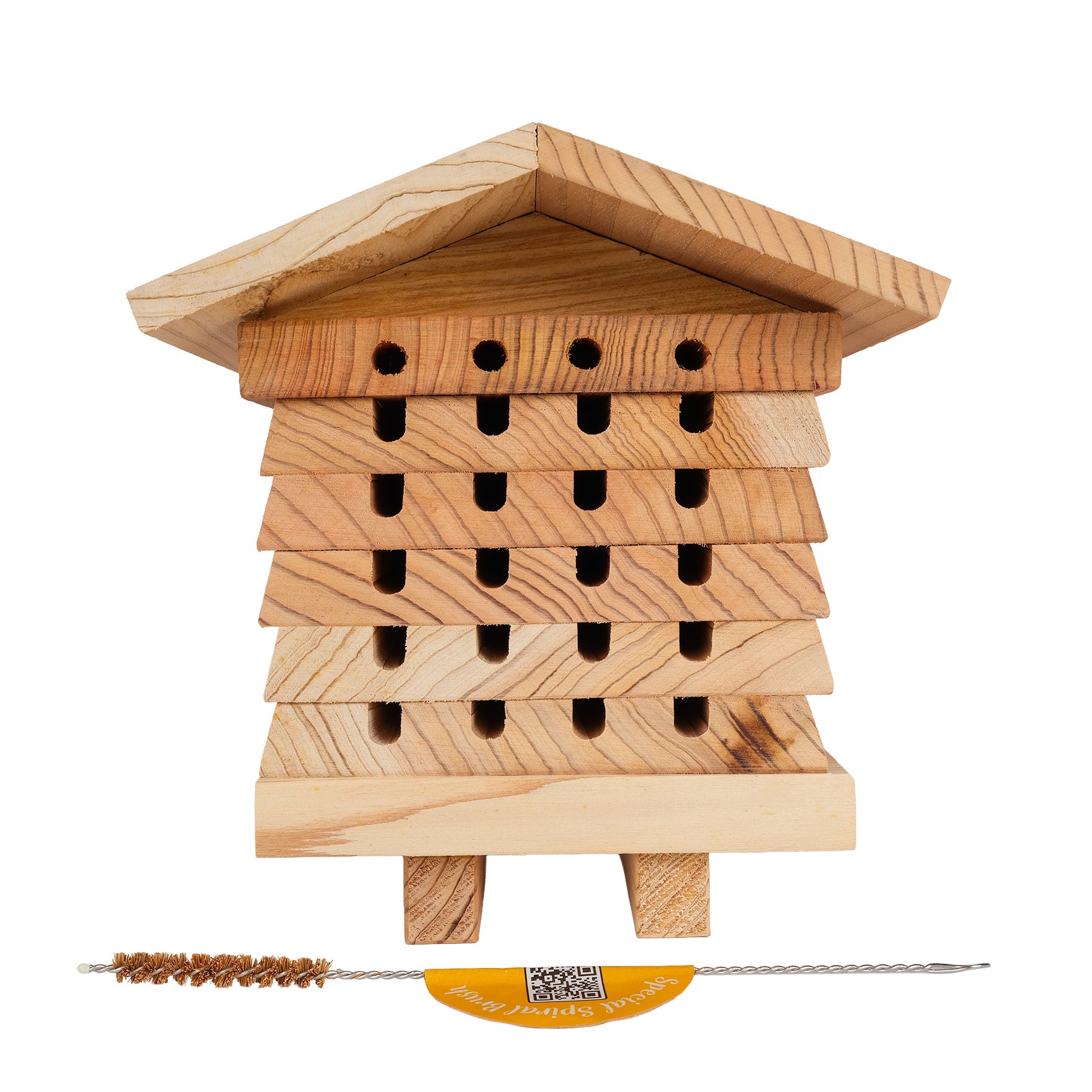 Wooden solitary bee hive with natural bristle and wire brush.