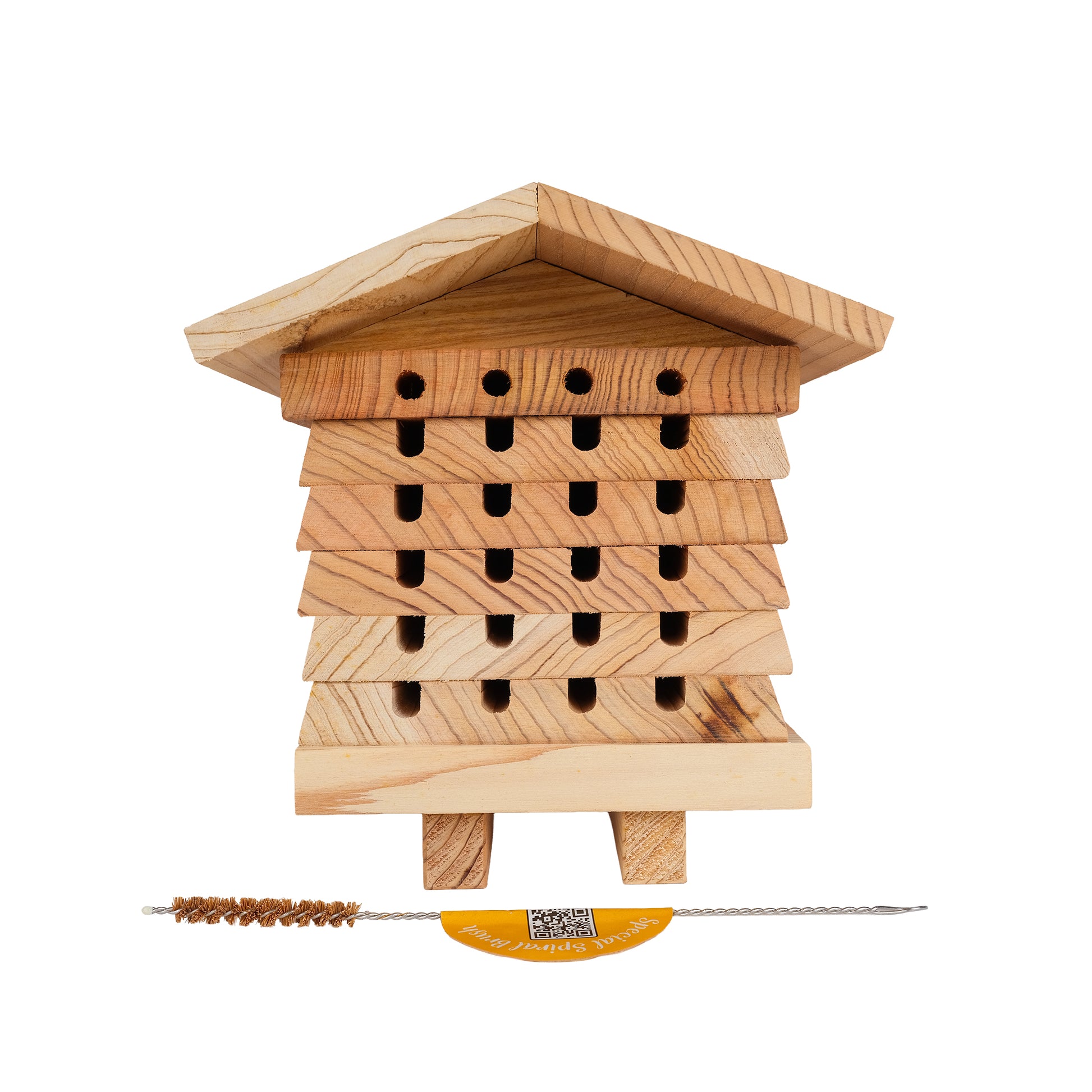 Solitary bee hive with brush.