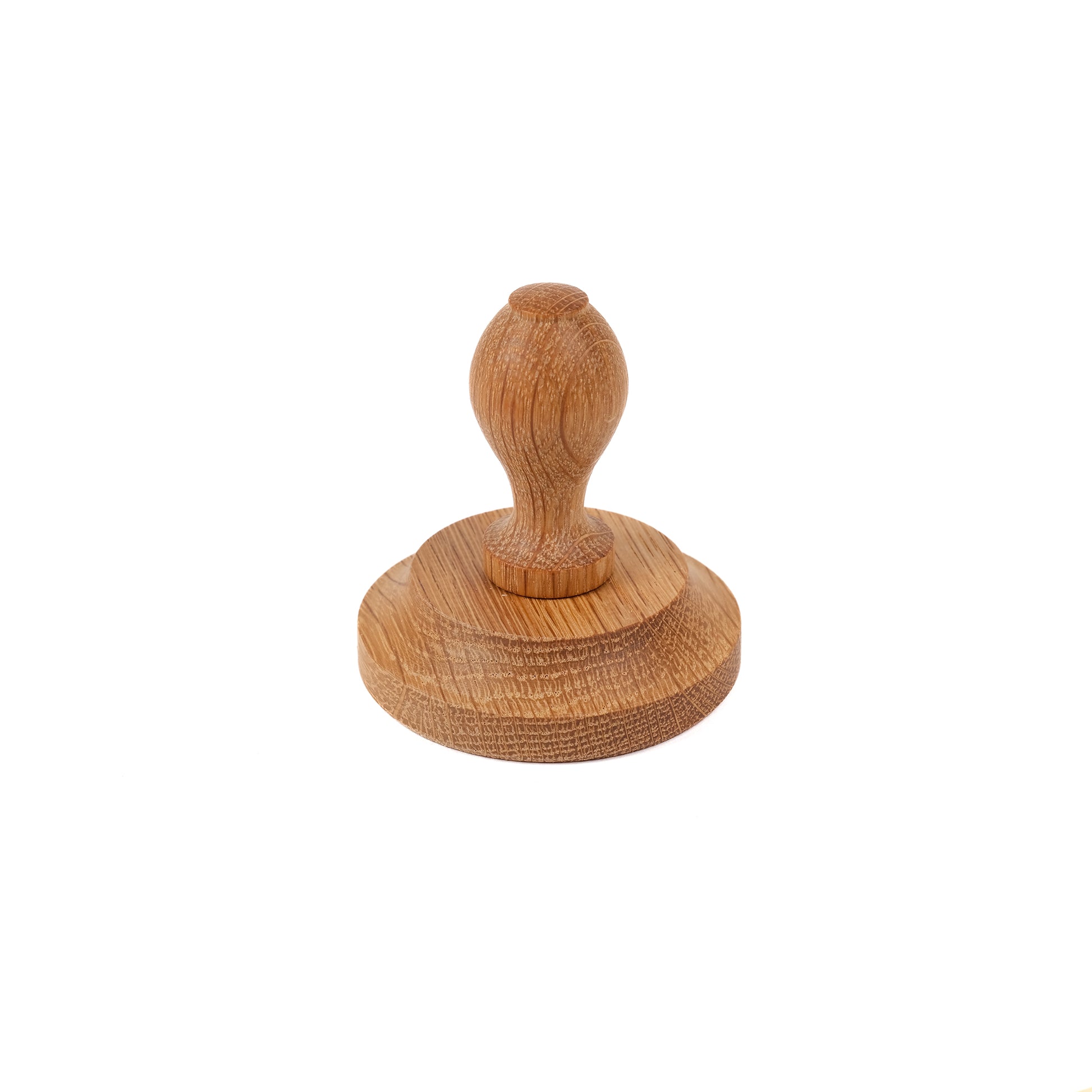 Round tamper made from sustainably sourced oak. Useful for pressing down compost in round plant pots before seed sowing.